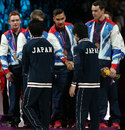 Team GB gymnasts shake the hands of their Japanese counterparts