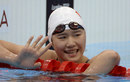 Ye Shiwen waves to the crowd after the 200m individual medley