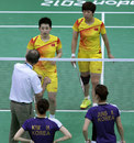 Thorsten Berg talks to world doubles champions Yang Yu and Xiaoli Wang 