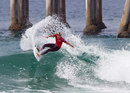 Stephanie Gilmore rides a wave in the Nike US Open of Surfing