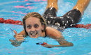 Fran Halsall celebrates after finishing 4th in the women's 100m freestyle semi-final 