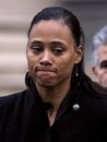 Marion Jones grimaces while making a statement after her sentencing at the Westchester County Federal Courthouse