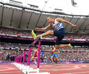 Dai Ggreene measures a hurdle in the 400m hurdles