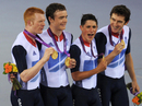 Great Britain's team pursuit squad accept their gold medals