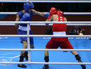 Andrew Selby of Great Britain lands a punch on Kazakhstan's Ilyas Suleimenov 