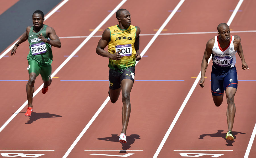 Usain Bolt eases home from James Dasaolu to win a 100m heat