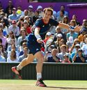 Andy Murray returns the ball to Roger Federer