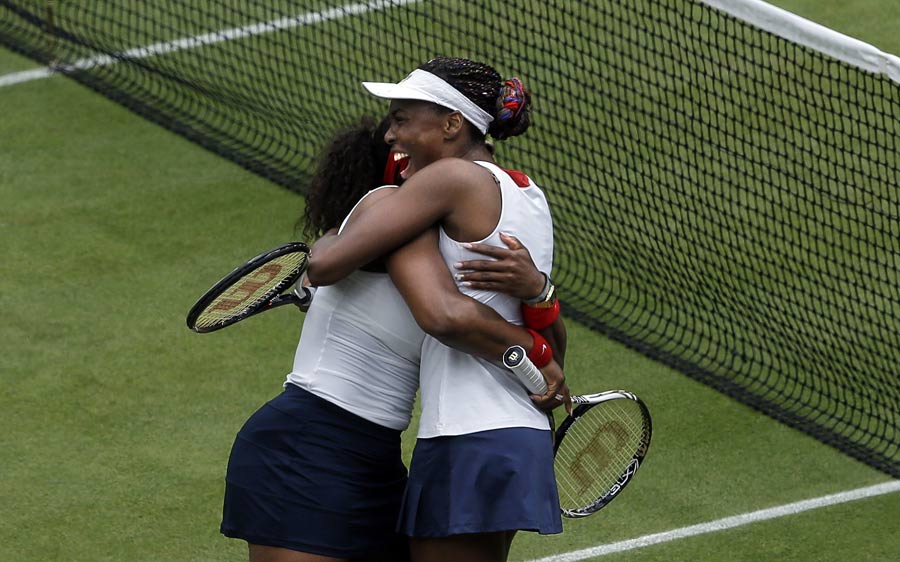 Serena and Venus Williams celebrate their victory