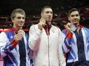 Max Whitlock, Krisztian Berki and Louis Smith show off their medals 