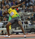 Usain Bolt celebrates his 100m final win