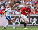Wayne Rooney runs with the ball