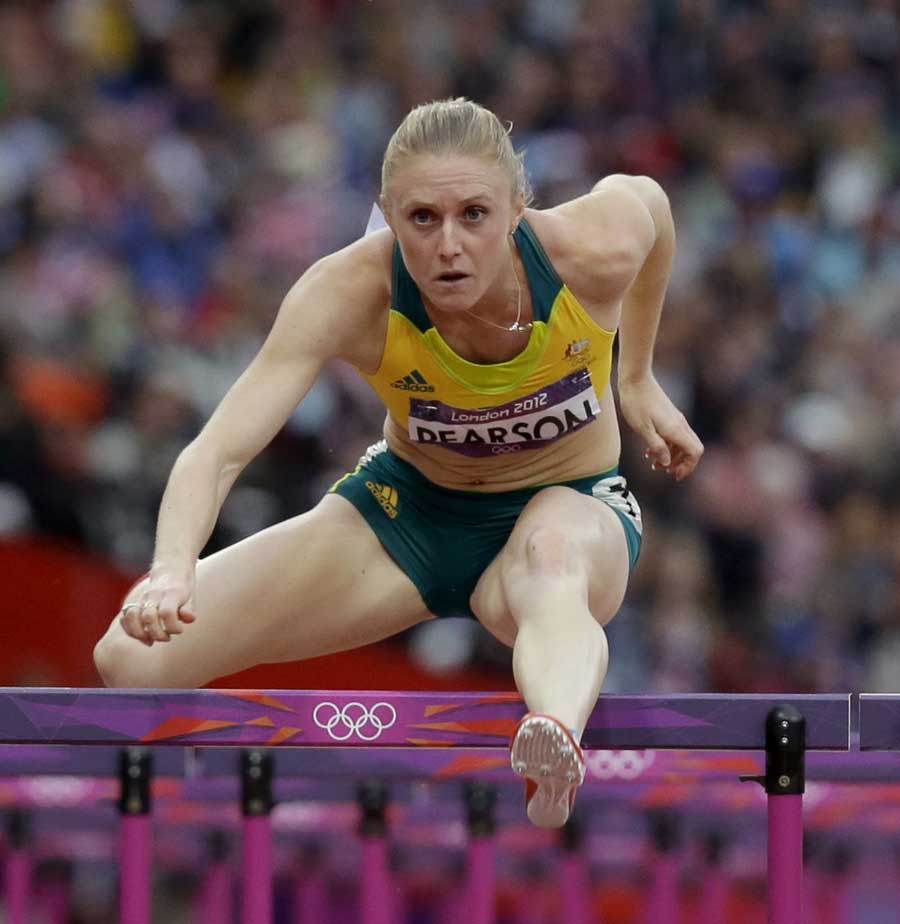 Sally Pearson clears a hurdle