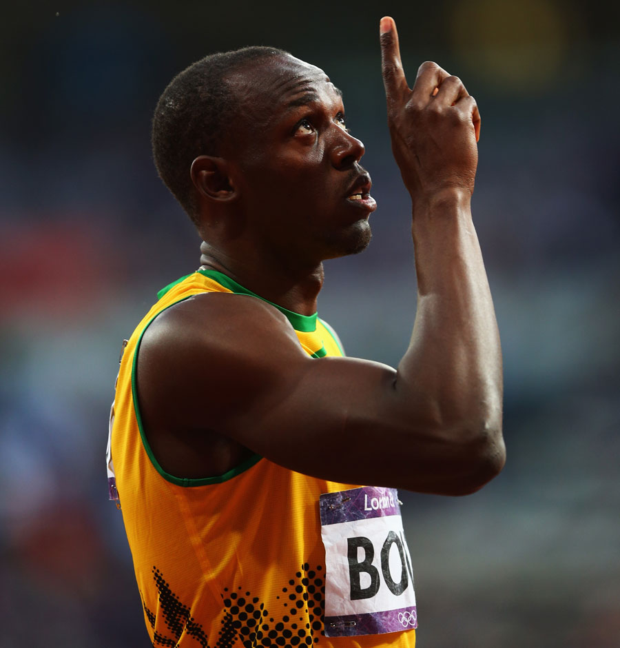 Usain Bolt looks to the sky after his semi-final win
