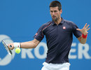 Novak Djokovic powers through a forehand
