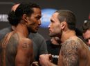 Benson Henderson and Frankie Edgar face off during the UFC 150 weigh-in