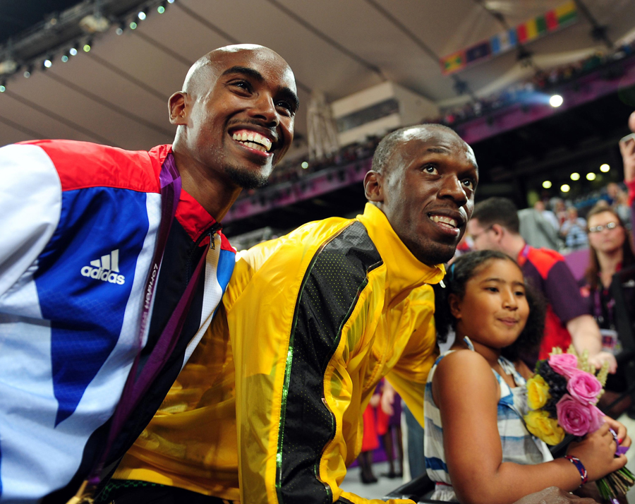 Mo Farah and Usain Bolt pose for a photo