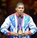 Anthony Joshua shows off his gold medal