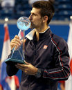 Novak Djokovic kisses the Rogers Cup trophy
