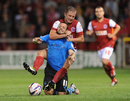 Jamie McGuire tries to tackle Andy Reid