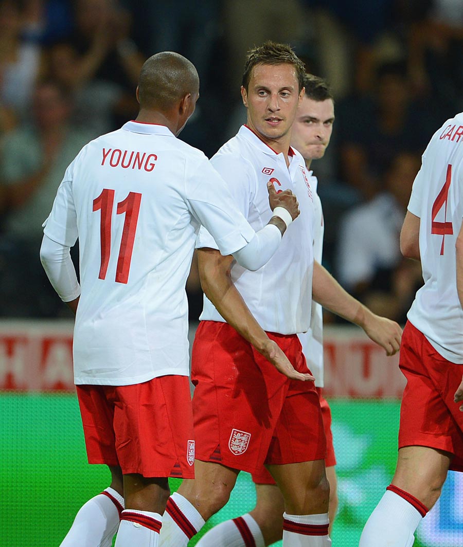 Ashley Young congratulates Phil Jagielka after scoring