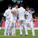 Alastair Cook embraces James Anderson after they combined to dismiss AB de Villiers