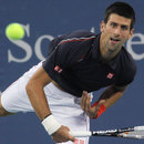 Novak Djokovic eyes a serve