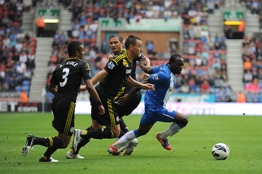 John Terry battles with Victor Moses