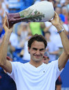 Roger Federer lifts the trophy for a fifth time
