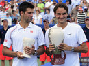 Novak Djokovic and Roger Federer pose with their trophies