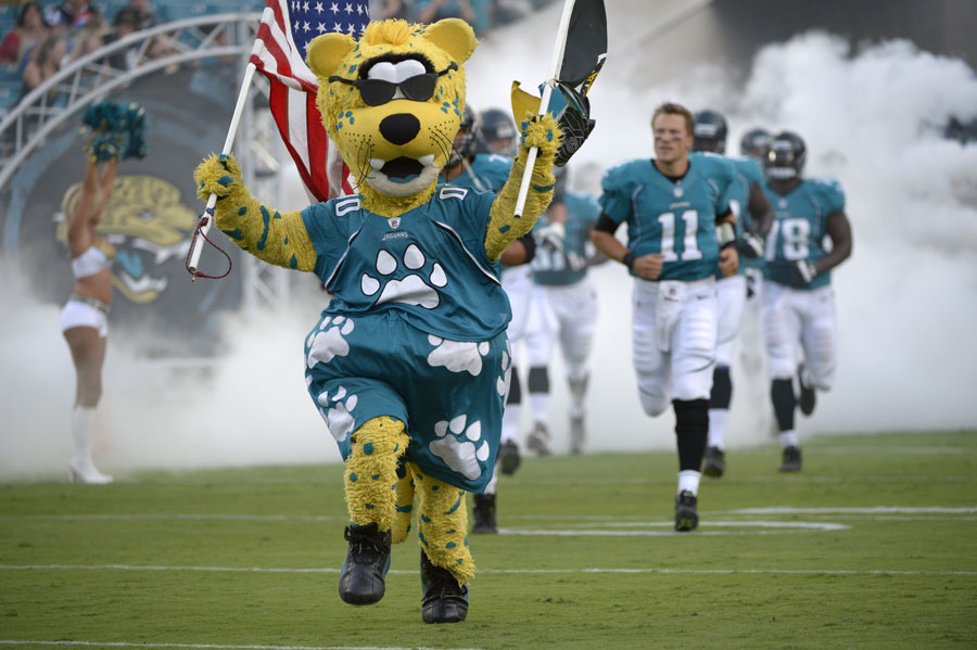Jacksonville Jaguars mascot Jaxson de Ville leads out the team