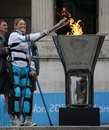 Claire Lomas lights the cauldron for the Paralympic Games