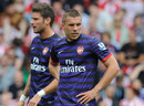 Olivier Giroud and Lukas Podolski await kick-off