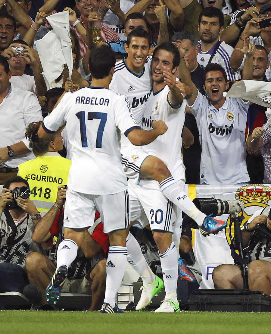 Real Madrid celebrate Gonzalo Higuain's opener