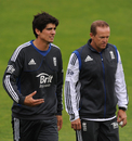 Alastair Cook discusses matters with Andy Flower