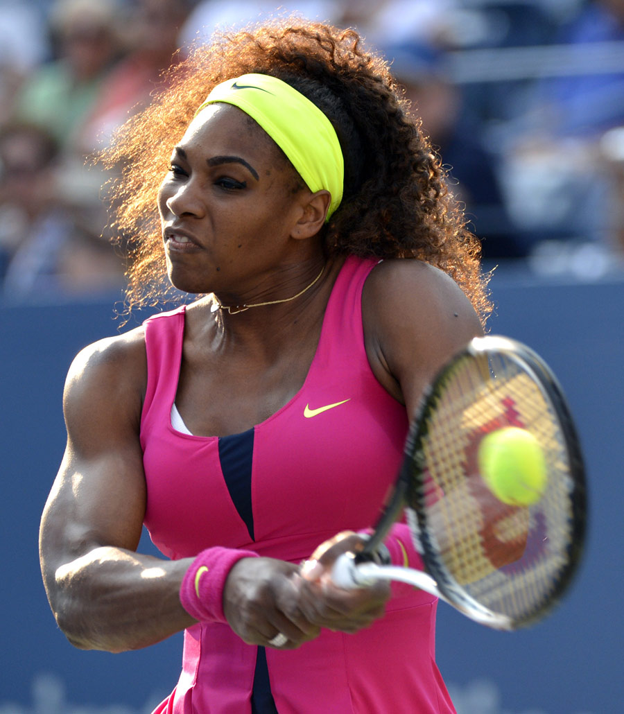 Serena Williams powers through a backhand