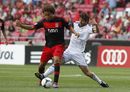 Axel Witsel fights for the ball with Esteban Granero