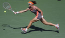 Sam Stosur stretches for a forehand