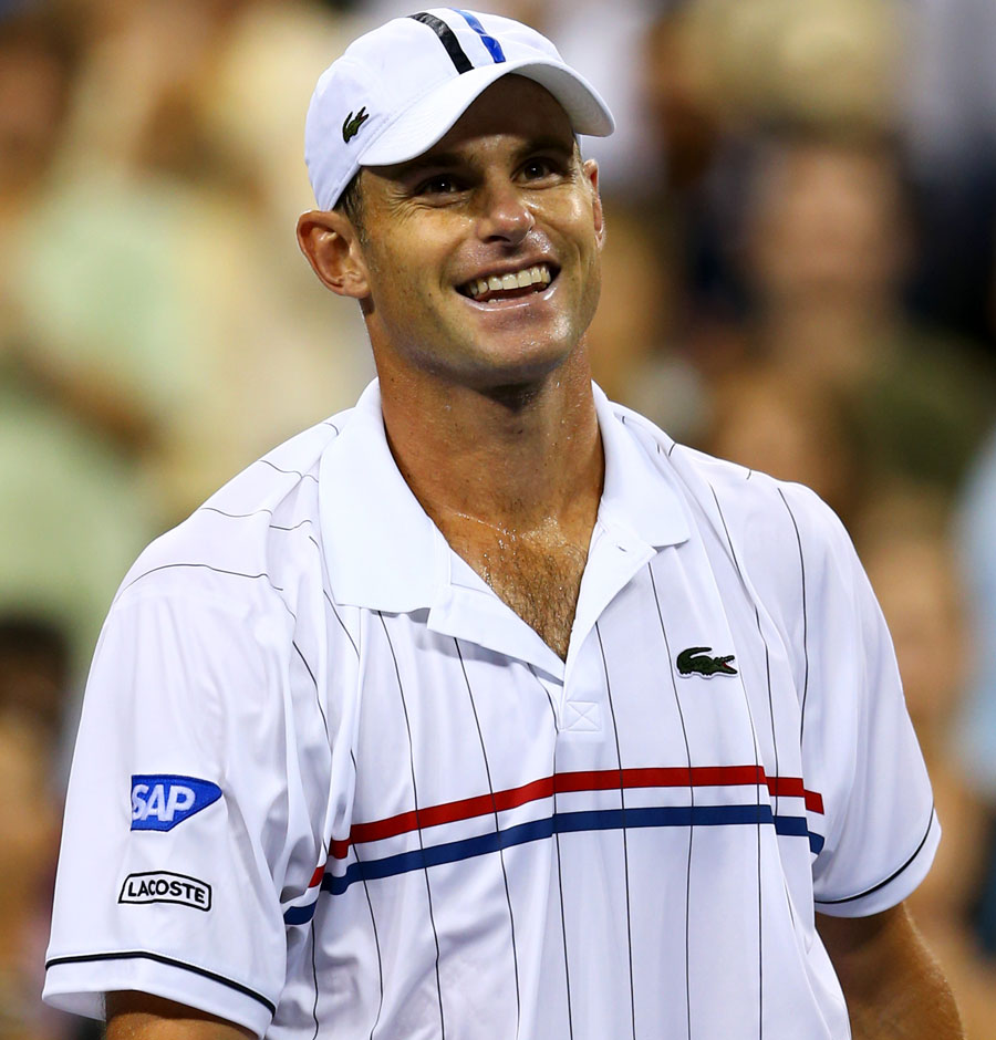 Andy Roddick smiles during his win over Bernard Tomic