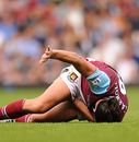 Andy Carroll lies injured on the floor