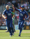 James Tredwell celebrates a wicket with Eoin Morgan