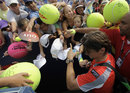 David Ferrer is mobbed by fans