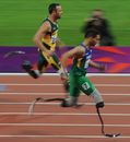 Oscar Pistorius is overtaken by Alan Oliveira during their 200m final