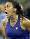 Marion Bartoli screams after claiming victory