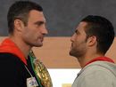 Vitali Klitschko and Manuel Charr stand face to face