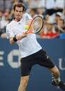 Andy Murray climbs into a backhand