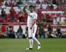 Ronaldo gestures to supporters while leaving the pitch