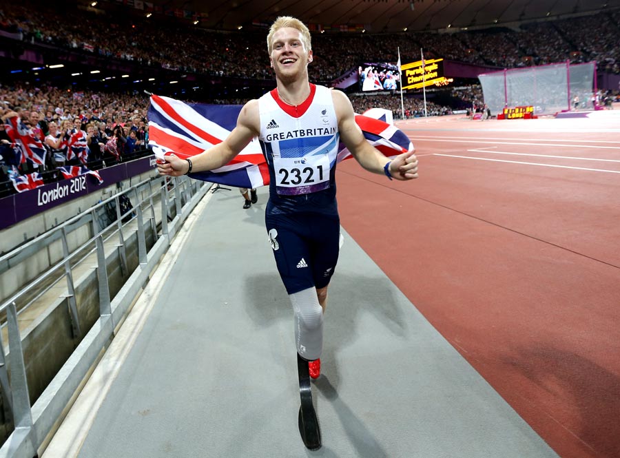 Jonnie Peacock celebrates victory in the men's T44 100m final