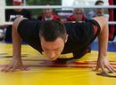 Vitali Klitschko exercises during an open training session