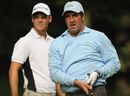Jose Maria Olazabal watches a shot with Martin Kaymer looking on