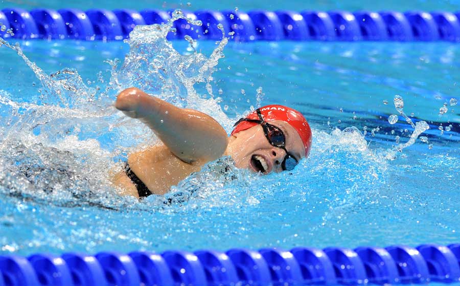 Louise Watkin competes in the pool